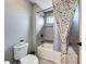 Updated bathroom with modern fixtures and a decorative shower curtain at 16150 Parkwyn St, Winter Garden, FL 34787
