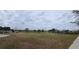Wide view of a lush community park featuring soccer goals, trees, and playground structures at 16150 Parkwyn St, Winter Garden, FL 34787