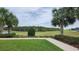 Exterior view from a community offering lush greenery and distant trees at 16150 Parkwyn St, Winter Garden, FL 34787