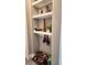 Cozy dog nook featuring shelving, food bowls, and toys, designed for pet comfort and organization at 16150 Parkwyn St, Winter Garden, FL 34787
