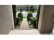 Charming brick walkway with manicured landscaping leading to a modern home, creating a welcoming entrance at 16150 Parkwyn St, Winter Garden, FL 34787