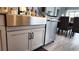 Modern kitchen featuring a stainless steel farmhouse sink, elegant countertops, and stainless steel appliances at 16150 Parkwyn St, Winter Garden, FL 34787