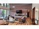 Lounge area with modern brick wall and a fireplace at 16150 Parkwyn St, Winter Garden, FL 34787