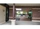Community pool access featuring dark brick and a glimpse of palm trees at 16150 Parkwyn St, Winter Garden, FL 34787