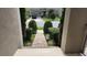 Inviting walkway leading to the home, surrounded by well-manicured landscaping at 16150 Parkwyn St, Winter Garden, FL 34787