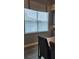 Bright window featuring white blinds, decorative cornice, and views of the outside at 16150 Parkwyn St, Winter Garden, FL 34787