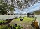 Backyard with garden and enclosed patio at 168 Bradwick Cir, Debary, FL 32713