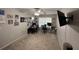 Bedroom with carpeted floor, window with blinds, ceiling fan, and television at 168 Bradwick Cir, Debary, FL 32713