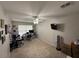 Bedroom with a ceiling fan, window with blinds, carpeted floor, and desks at 168 Bradwick Cir, Debary, FL 32713