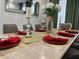 Formal dining room setting featuring elegant tableware, candles, and floral decor for sophisticated gatherings at 168 Bradwick Cir, Debary, FL 32713