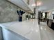A close-up of a kitchen countertop displaying modern decor and a partial view of the adjacent dining area at 168 Bradwick Cir, Debary, FL 32713