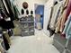 Bright walk-in closet with organized storage solutions and a view into the bedroom at 168 Bradwick Cir, Debary, FL 32713