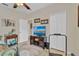 Bedroom features a bed, a television with a media stand, and a closet with mirrored doors at 19331 Briercrest Trl, Orlando, FL 32833