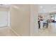 Hallway that provides a glimpse into a breakfast nook and kitchen area at 19331 Briercrest Trl, Orlando, FL 32833