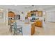 Bright kitchen featuring a center island, stainless steel appliances, and ample cabinet space at 19331 Briercrest Trl, Orlando, FL 32833