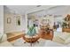 Spacious interior with hardwood floors in the dining area, providing an airy and open feel at 19331 Briercrest Trl, Orlando, FL 32833