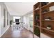 Bright office space features wood floors, large windows, and modern shelving at 2286 Sunny St, Kissimmee, FL 34741