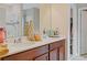 Bathroom with double vanity, a neutral color palette, and a separate glass-enclosed shower at 2711 Wadeview Loop, St Cloud, FL 34769