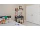 Cozy bedroom featuring a vanity with a mirror and a closet with white doors at 2711 Wadeview Loop, St Cloud, FL 34769