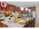 Well-designed kitchen featuring seating at the island, decor, and modern lighting at 2711 Wadeview Loop, St Cloud, FL 34769