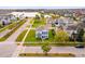 Charming two-story home with a well-manicured lawn and beautiful lakeside views at 2800 Cello Ln, Kissimmee, FL 34741