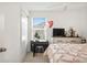 Bedroom with a bed, desk area, and a ceiling fan at 2800 Cello Ln, Kissimmee, FL 34741