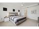 Bright bedroom featuring neutral walls, carpet flooring, and a ceiling fan at 2800 Cello Ln, Kissimmee, FL 34741