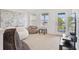 Comfortable bonus room area with bean bag chairs and lots of natural light at 2800 Cello Ln, Kissimmee, FL 34741