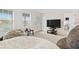 Bright bonus room featuring comfortable seating and natural light at 2800 Cello Ln, Kissimmee, FL 34741