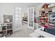 Well-organized craft room with storage and natural light at 2800 Cello Ln, Kissimmee, FL 34741