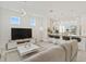 Open-concept living room featuring bar seating at 2800 Cello Ln, Kissimmee, FL 34741