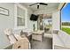 Inviting screened lanai perfect for relaxing and outdoor dining at 2800 Cello Ln, Kissimmee, FL 34741