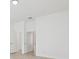 A bright bedroom with white walls and tile flooring at 411 Boxwood Dr, Davenport, FL 33837