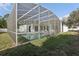 Enclosed pool and patio area provides privacy and adds to the home's appeal and would be great for entertaining at 411 Boxwood Dr, Davenport, FL 33837