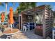 Community cabana rentals with TVs, tables, chairs, and cushioned seating for a relaxing vacation lifestyle at 4138 Lana Ave, Davenport, FL 33897