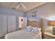 Bright bedroom featuring a comfortable bed and spacious closet with ample storage at 500 Monroe Cir, Davenport, FL 33896