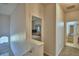 Hallway view to a bathroom and bedroom at 500 Monroe Cir, Davenport, FL 33896