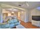 Spacious living room offers an open layout with views of the kitchen and access to other areas of the home at 500 Monroe Cir, Davenport, FL 33896