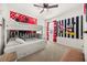 Fun bedroom with playful Mickey Mouse themed decor and bunk beds at 5117 Oakbourne Ave, Davenport, FL 33837