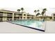 Large community pool with blue tile accents at 5245 W Irlo Bronson Memorial Hwy # 192, Kissimmee, FL 34746