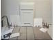Interior design samples featuring tiling, flooring, cabinets, and a stainless steel faucet at 5457 Catmint Dr, Lake Hamilton, FL 33851