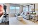 Cozy living room with comfortable seating, a desk, and modern decor at 5457 Catmint Dr, Lake Hamilton, FL 33851
