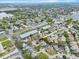 An aerial view of the property nestled within a vibrant neighborhood, showcasing its desirable location and community setting at 623 Lake Dexter Cir, Winter Haven, FL 33884