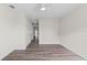Bright room featuring wood-look floors and neutral walls and walk-in closet at 623 Lake Dexter Cir, Winter Haven, FL 33884