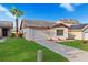 Charming single-story home featuring a well-maintained front yard, a private garage, and lovely curb appeal at 623 Lake Dexter Cir, Winter Haven, FL 33884