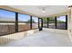 Sunroom featuring many windows with natural lighting at 623 Lake Dexter Cir, Winter Haven, FL 33884