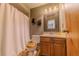 Cozy bathroom featuring a vanity, toilet, mirror, and shower-tub combo at 6449 Eve St, St Cloud, FL 34771