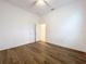 Large bedroom with wood floors and a closet at 6974 Trellis Vine Loop, Windermere, FL 34786
