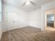 This bedroom features a ceiling fan, carpet, and a double door closet at 6974 Trellis Vine Loop, Windermere, FL 34786