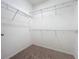 Carpeted walk-in closet with wire shelving at 6974 Trellis Vine Loop, Windermere, FL 34786